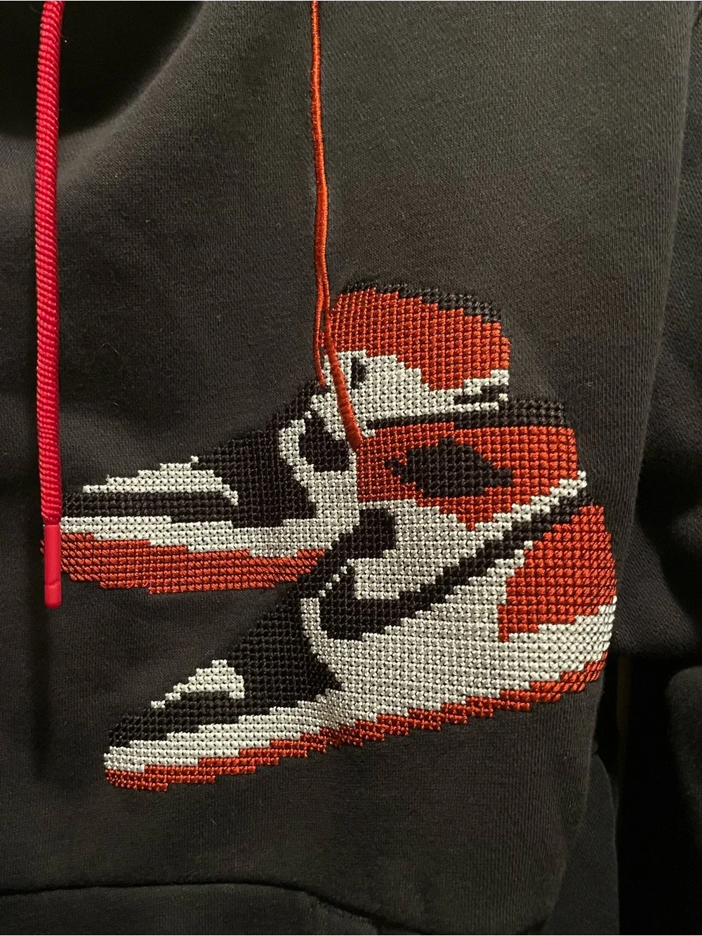 Jordan Black Hoodie with Red and White Sneaker Graphic
